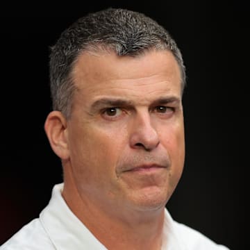 Sep 13, 2025; Miami Gardens, Florida, USA; Miami Hurricanes head coach Mario Cristobal looks on against the South Florida Bulls during the second quarter at Hard Rock Stadium. Mandatory Credit: Sam Navarro-Imagn Images