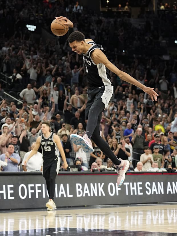 San Antonio Spurs forward Victor Wembanyama (1) reacts after a victory over the Denver Nuggets at Frost Bank Center.