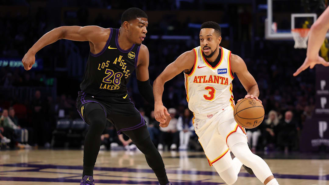 Jan 13, 2026; Los Angeles, California, USA;  Atlanta Hawks guard CJ McCollum (3) drives to the basket against Los Angeles Lakers forward Rui Hachimura (28) during the first half at Crypto.com Arena. Mandatory Credit: Kiyoshi Mio-Imagn Images