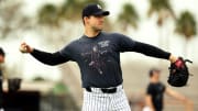 Feb 15, 2024; Tampa, FL, USA; New York Yankees relief pitcher Tommy Kahnle (41) throws during spring