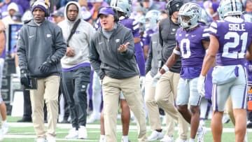 Oct 28, 2023; Manhattan, Kansas, USA; Kansas State Wildcats head coach Chris Klieman yells to his players during the second quarter against the Houston Cougars at Bill Snyder Family Football Stadium. Mandatory Credit: Scott Sewell-USA TODAY Sports