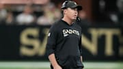 Oct 5, 2025; New Orleans, Louisiana, USA; New Orleans Saints head coach Kellen Moore walks along the sideline during the game against the New York Giants during the second quarter at Caesars Superdome. Mandatory Credit: Matthew Hinton-Imagn Images