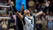 Purdue Junior Taylor Anderson (5) returns a dig