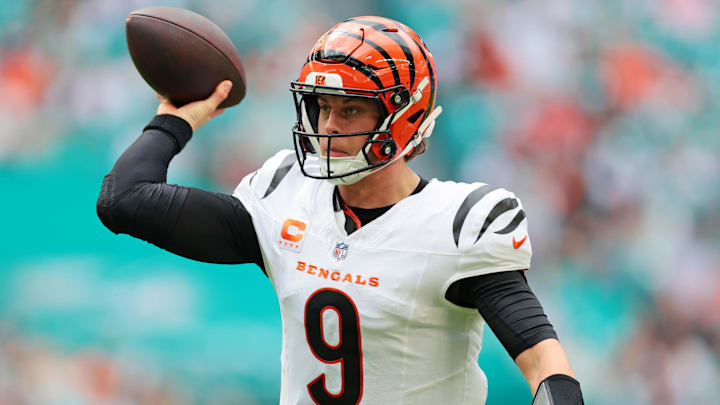 Dec 21, 2025; Miami Gardens, Florida, USA; Cincinnati Bengals quarterback Joe Burrow (9) looks to make a pass during the third quarter against the Cincinnati Bengals at Hard Rock Stadium. Mandatory Credit: Sam Navarro-Imagn Images