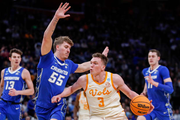 Tennessee guard Dalton Knecht (3) dribbles against Creighton guard Baylor Scheierman (55) during the second half of the NCAA tournament Midwest Regional Sweet 16 round at Little Caesars Arena in Detroit on Friday, March 29, 2024.
