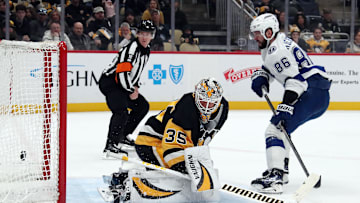 Jan 12, 2025; Pittsburgh, Pennsylvania, USA;  Tampa Bay Lightning right wing Nikita Kucherov (86) scores his second goal of the game against the Pittsburgh Penguins goaltender Tristan Jarry (35) during the third period at PPG Paints Arena. Mandatory Credit: Charles LeClaire-Imagn Images
