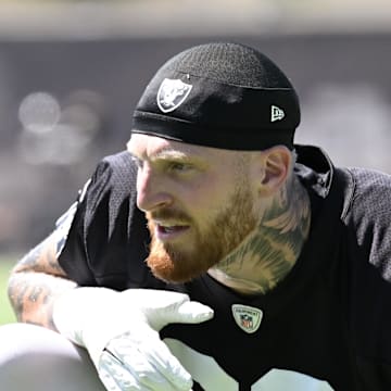 Jun 10, 2025; Henderson, NV, USA; Las Vegas Raiders defensive end Maxx Crosby (98) looks on during the team stretch during Las Vegas Raiders Minicamp at Intermountain Health Performance Center. Mandatory Credit: Candice Ward-Imagn Images