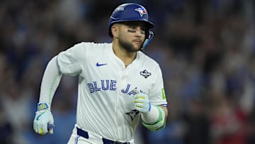 Nov 1, 2025; Toronto, Ontario, CAN; Toronto Blue Jays designated hitter Bo Bichette (11) runs after hitting a three run home run against the Los Angeles Dodgers in the third inning during game seven of the 2025 MLB World Series at Rogers Centre. Mandatory Credit: John E. Sokolowski-Imagn Images