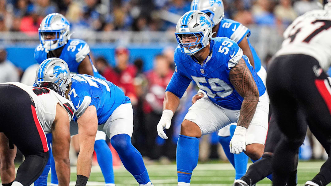 Detroit Lions offensive tackle Giovanni Manu (59) gets ready for a snap against the Houston Texans during the second half at Ford Field in Detroit on Saturday, August 23, 2025.