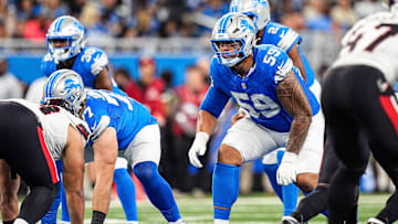 Detroit Lions offensive tackle Giovanni Manu (59) gets ready for a snap against the Houston Texans during the second half at Ford Field in Detroit on Saturday, August 23, 2025.