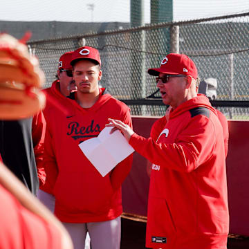 Cincinnati Reds manager Terry Francona speaks with pitchers before training, Wednesday, Feb. 19, 2025, at the Cincinnati Reds Player Development Complex in Goodyear, Ariz.