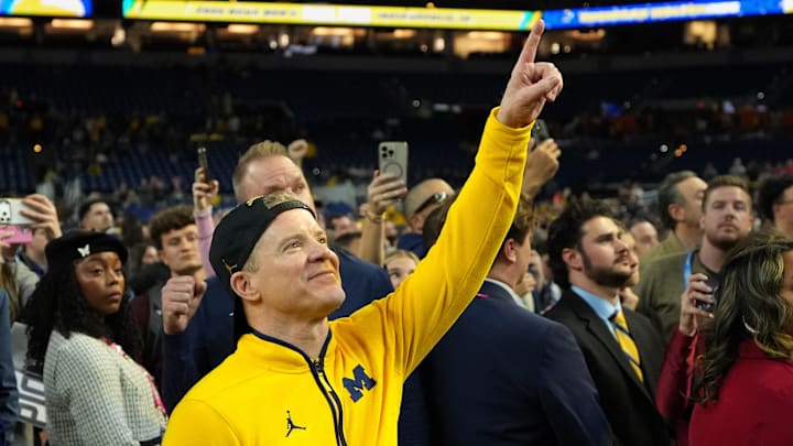 Apr 6, 2026; Indianapolis, IN, USA; Michigan Wolverines head coach Dusty May watches One Shining Moment after the National Championship of the Final Four of the men's 2026 NCAA Tournament at Lucas Oil Stadium. Mandatory Credit: Bob Donnan-Imagn Images