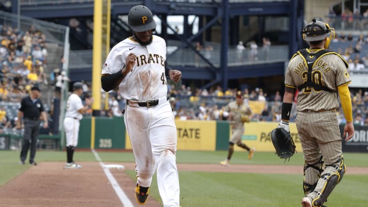 Pittsburgh Pirates left fielder Bryan De La Cruz (41) crosses home plate to score a run against the San Diego Padres during the sixth inning at PNC Park. 