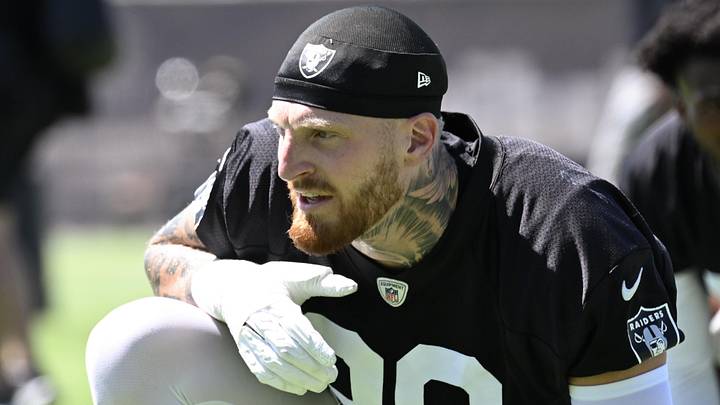 Jun 10, 2025; Henderson, NV, USA; Las Vegas Raiders defensive end Maxx Crosby (98) looks on during the team stretch during Las Vegas Raiders Minicamp at Intermountain Health Performance Center. Mandatory Credit: Candice Ward-Imagn Images