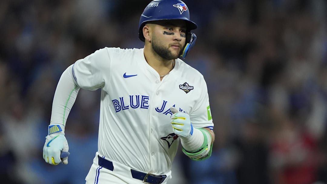 Nov 1, 2025; Toronto, Ontario, CAN; Toronto Blue Jays designated hitter Bo Bichette (11) runs after hitting a three run home run against the Los Angeles Dodgers in the third inning during game seven of the 2025 MLB World Series at Rogers Centre. 