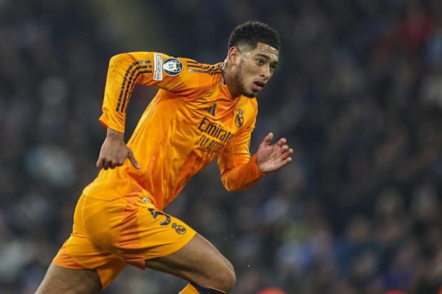 Real Madrid midfielder Jude Bellingham running. 