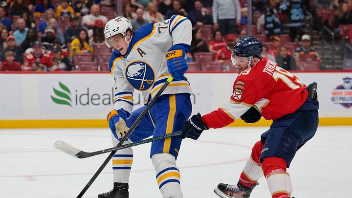 Feb 27, 2026; Sunrise, Florida, USA; Buffalo Sabres center Tage Thompson (72) moves the puck against Florida Panthers left wing Matthew Tkachuk (19) during the third period at Amerant Bank Arena. Mandatory Credit: Sam Navarro-Imagn Images