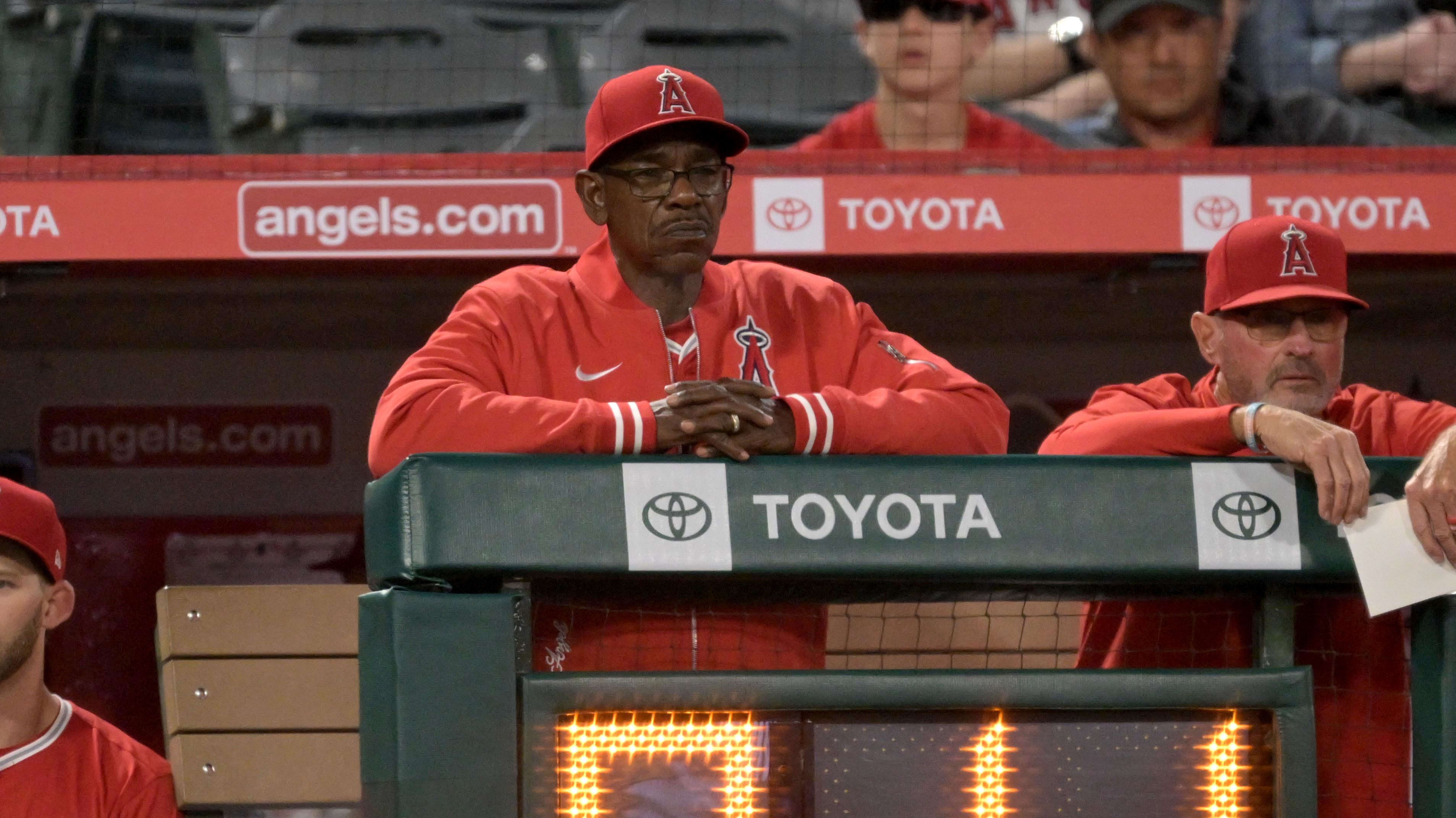 Apr 12, 2024; Baltimore, Maryland, USA; Milwaukee Brewers coach Rickie Weeks Jr. (center).