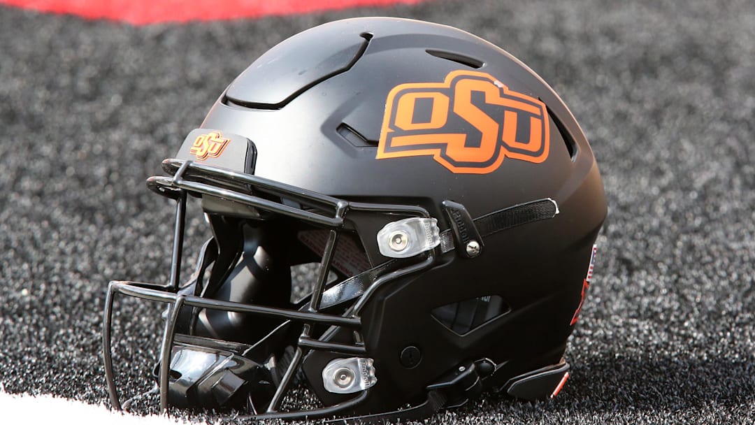 Oct 25, 2025; Lubbock, Texas, USA;  A general view of an Oklahoma State Cowboys helmet on the field before the game against the Texas Tech Red Raiders at Jones AT&T Stadium. Mandatory Credit: Michael C. Johnson-Imagn Images