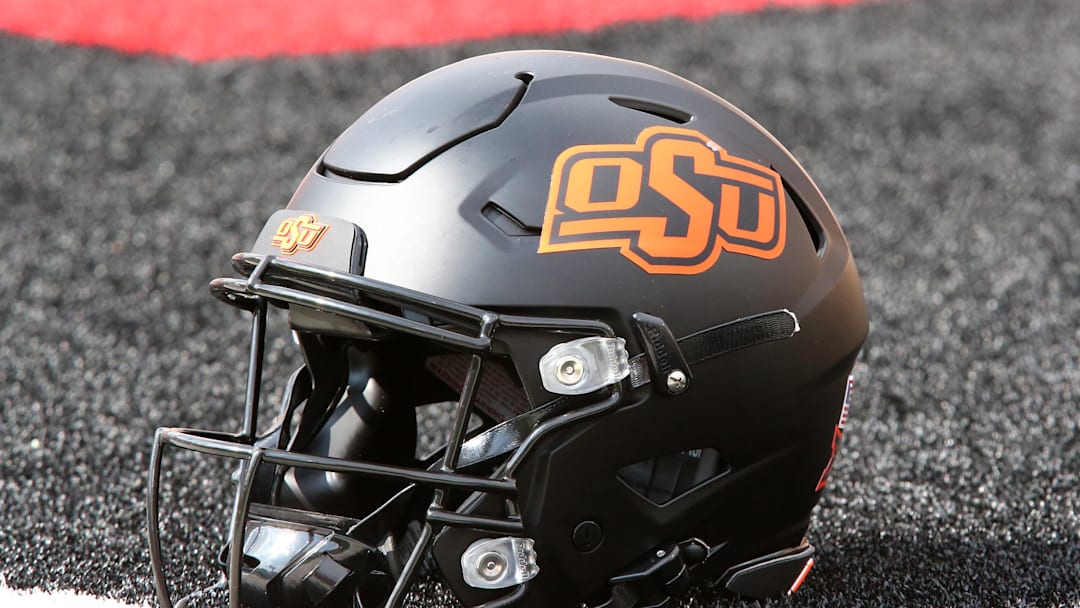 Oct 25, 2025; Lubbock, Texas, USA;  A general view of an Oklahoma State Cowboys helmet on the field before the game against the Texas Tech Red Raiders at Jones AT&T Stadium. Mandatory Credit: Michael C. Johnson-Imagn Images