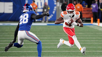 Sep 21, 2025; East Rutherford, New Jersey, USA; Kansas City Chiefs wide receiver Tyquan Thornton (80) runs against New York Giants cornerback Cordale Flott (28) in the second quarter at MetLife Stadium. Mandatory Credit: Robert Deutsch-Imagn Images