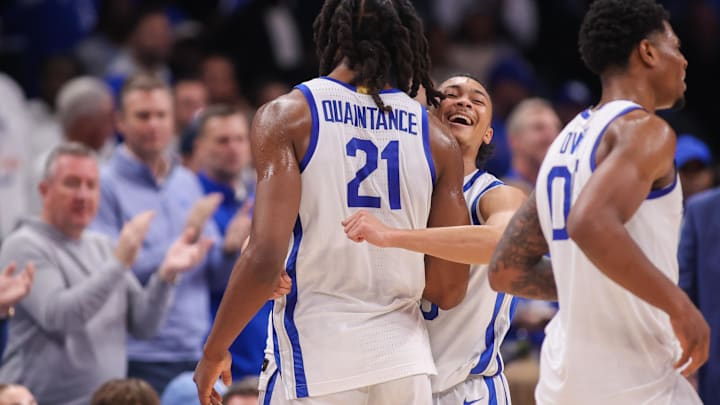 Dec 20, 2025; Atlanta, Georgia, USA; Kentucky Wildcats forward Jayden Quaintance (21) reacts with St. John Red Storm guard Jaland Lowe (15) in the second half at State Farm Arena. Mandatory Credit: Brett Davis-Imagn Images

