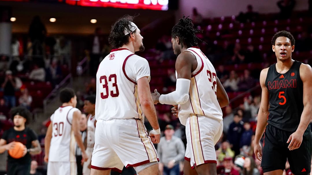 Boden Kapke celebrates with Jayden Hastings at Conte Forum on Feb. 7, 2026.