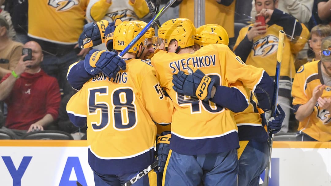 Mar 27, 2025; Nashville, Tennessee, USA;  Nashville Predators defenseman Brady Skjei (76) celebrates his goal with his teammates against the St. Louis Blues during the first period at Bridgestone Arena. Mandatory Credit: Steve Roberts-Imagn Images