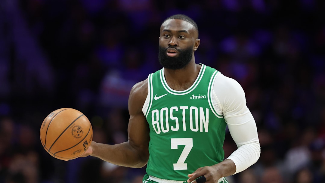 Apr 30, 2026; Philadelphia, Pennsylvania, USA; Boston Celtics guard Jaylen Brown (7) dribbles the ball against the Philadelphia 76ers during the first quarter at Xfinity Mobile Arena.