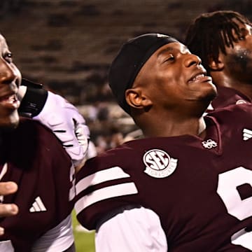 Mississippi State Bulldogs players react after defeating the Eastern Kentucky Colonels at Davis Wade Stadium at Scott Field.