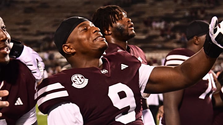 Mississippi State Bulldogs players react after defeating the Eastern Kentucky Colonels at Davis Wade Stadium at Scott Field.