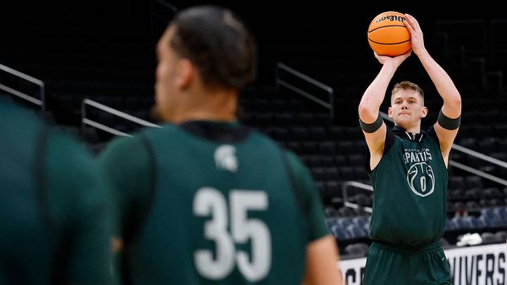 Mar 26, 2026; Washington, DC, USA; Michigan State Spartans forward Jaxon Kohler (0) shoots during a practice session ahead of the east regional of the men's 2026 NCAA Tournament at Capital One Arena. Mandatory Credit: Geoff Burke-Imagn Images