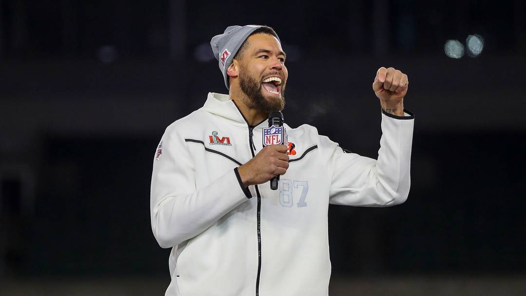 Feb 7, 2022; Cincinnati, OH, USA; Cincinnati Bengals tight end C.J. Uzomah (87) speaks during the Super Bowl Opening Night Fan Rally at Paul Brown Stadium. Mandatory Credit: Katie Stratman-USA TODAY Sports