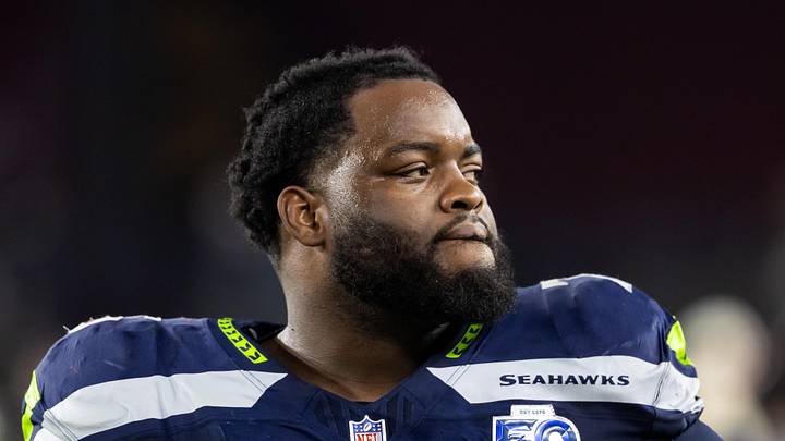 Seattle Seahawks guard Anthony Bradford looks at the action