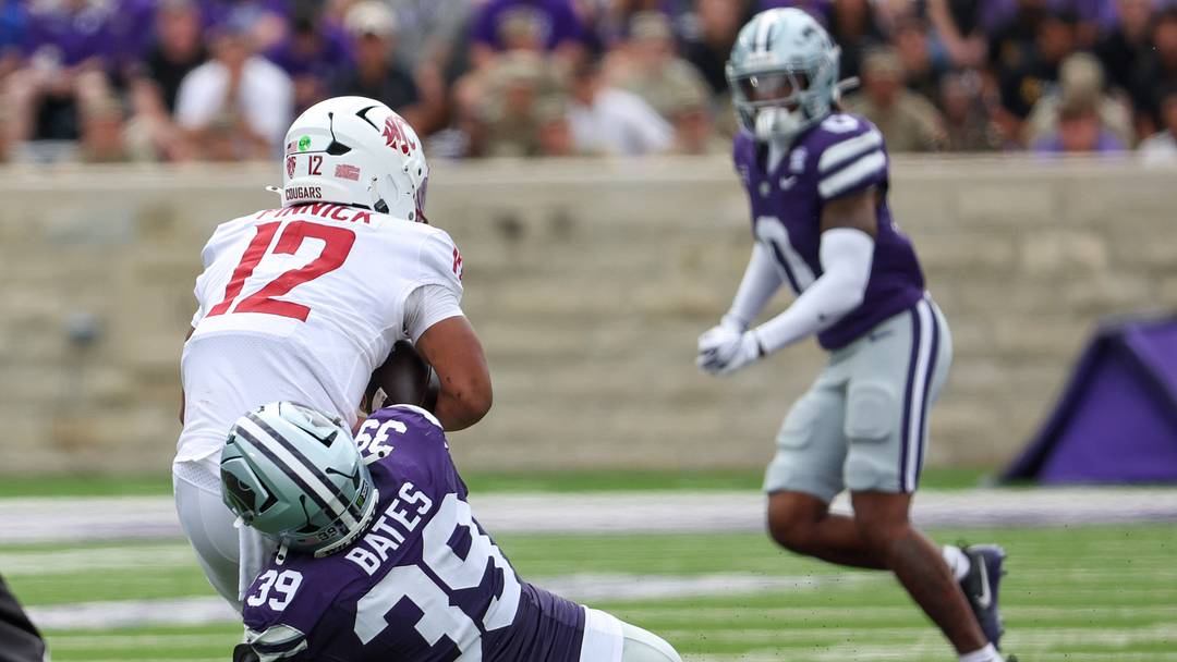 Sep 12, 2026; Manhattan, Kansas, USA; Kansas State Wildcats defensive end Travis Bates (39) sacks Washington State Cougars quarterback Caden Pinnick (12) during the second quarter at Bill Snyder Family Football Stadium. Mandatory Credit: Scott Sewell-Imagn Images Sep 12, 2026; Manhattan, Kansas, USA; Kansas State Wildcats defensive end Travis Bates (39) sacks Washington State Cougars quarterback Caden Pinnick (12) during the second quarter at Bill Snyder Family Football Stadium. Mandatory Credit: Scott Sewell-Imagn Images