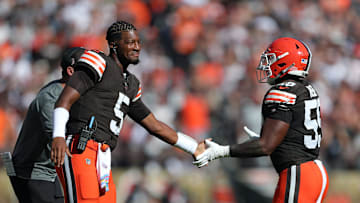 Cleveland Browns quarterback Jameis Winston (5) celebrates a touchdown with Cleveland Browns linebacker Winston Reid (59) during the first half of an NFL football game against the Cincinnati Bengals at Huntington Bank Field, Sunday, Oct. 20, 2024, in Cleveland, Ohio.