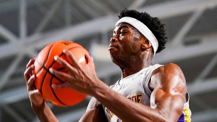 Montverde Academy Eagles guard CJ Ingram (11) goes up for a layup against the Oak Ridge Pioneers in the City of Palms Classic semifinal game at Suncoast Credit Union Arena in Fort Myers on Saturday, Dec. 21, 2024.