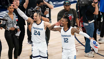 Apr 29, 2022; Minneapolis, Minnesota, USA; Memphis Grizzlies forward Dillon Brooks (24) and guard Ja Morant (12) celebrate after the game against the Minnesota Timberwolves after game six of the first round for the 2022 NBA playoffs at Target Center. Mandatory Credit: Brad Rempel-Imagn Images