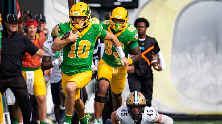 Oregon quarterback Luke Moga carries the ball as the Oregon Ducks host the Montana State Bobcats on Aug. 30, 2025, at Autzen Stadium in Eugene, Oregon.