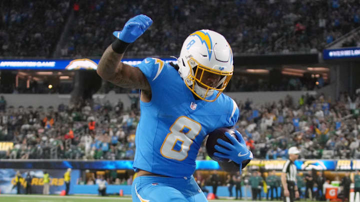 Dec 8, 2025; Inglewood, California, USA; Los Angeles Chargers running back Omarion Hampton (8) runs for a touchdown against the Philadelphia Eagles in the first half at SoFi Stadium. Mandatory Credit: Kirby Lee-Imagn Images