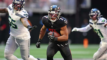 ESPN predicts Bijan Robinson to pile up points as a receiver as the Atlanta Falcons take on the Seattle Seahawks. 