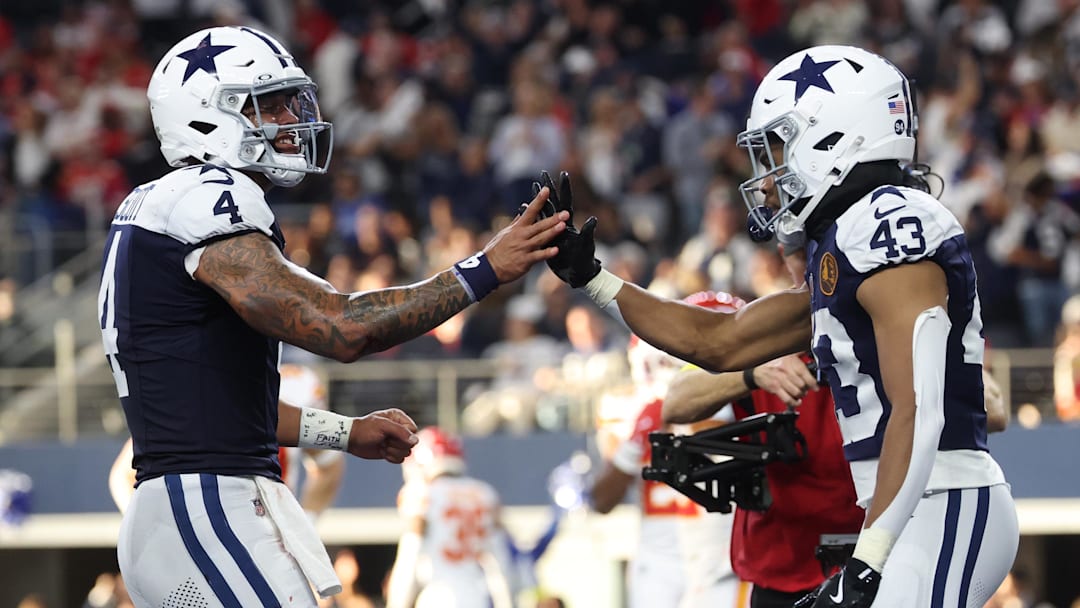 Nov 27, 2025; Arlington, Texas, USA; Dallas Cowboys quarterback Dak Prescott (4) and Dallas Cowboys running back Malik Davis (43) celebrate after a touchdown against the Kansas City Chiefs during the second quarter at AT&T Stadium. 