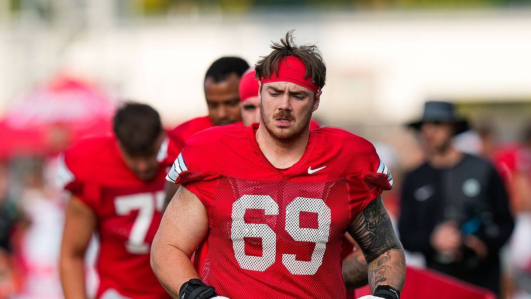 Ohio State Buckeyes offensive lineman Ian Moore (69) runs on the field during the third day of training camp at the Woody Hayes Athletic Center on Aug. 8, 2026 in Columbus, Ohio. Ohio State Buckeyes offensive lineman Ian Moore (69) runs on the field during the third day of training camp at the Woody Hayes Athletic Center on Aug. 8, 2026 in Columbus, Ohio.