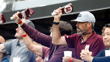 Mississippi State Bulldogs fans ring their cowbells during the first quarter against the Texas Longhorns at Davis Wade Stadium at Scott Field.