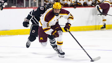 Minnesota forward Jimmy Snuggerud, front, skates with the puck against Omaha during the Ice Breaker Tournament on Oct. 12, 2024, in Las Vegas. 