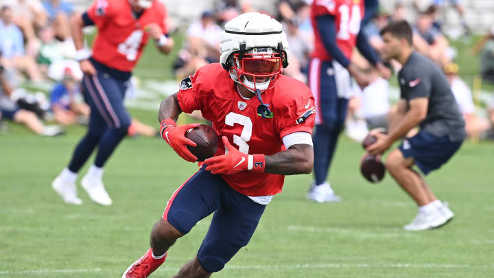 Aug 03, 2024; Foxborough, MA, USA; New England Patriots wide receiver DeMario Douglas (3) runs after the catch during training camp at Gillette Stadium. Mandatory Credit: Eric Canha-USA TODAY Sports