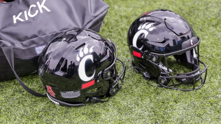 Oct 30, 2021; New Orleans, Louisiana, USA;  Cincinnati Bearcats helmets on the ground during the game against Tulane Green Wave during the second half at Yulman Stadium. Mandatory Credit: Stephen Lew-USA TODAY Sports