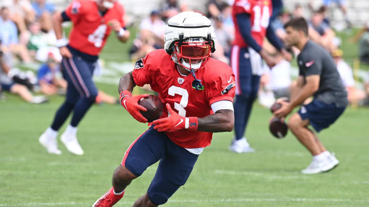 Aug 03, 2024; Foxborough, MA, USA; New England Patriots wide receiver DeMario Douglas (3) runs after the catch during training camp at Gillette Stadium. Mandatory Credit: Eric Canha-USA TODAY Sports