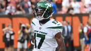 Sep 18, 2022; Cleveland, Ohio, USA; New York Jets wide receiver Garrett Wilson (17) celebrates after catching a touchdown during the fourth quarter against the Cleveland Browns at FirstEnergy Stadium.