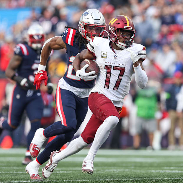 Washington Commanders receiver Terry McLaurin runs the ball during the second half against the New England Patriots